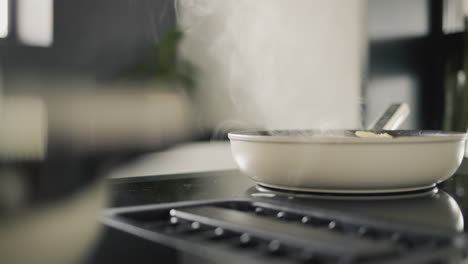 potatoes are fried on a modern induction cooker. built-in extractor works. side view