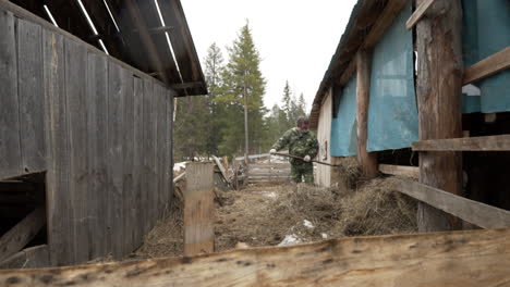 farmer working in a rural barn