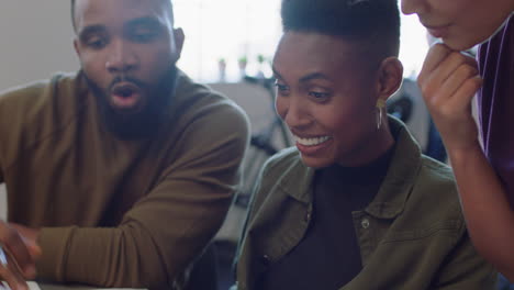 happy business people celebrating corporate success black colleagues enjoying successful victory clapping watching laptop in cheerful office workplace close up