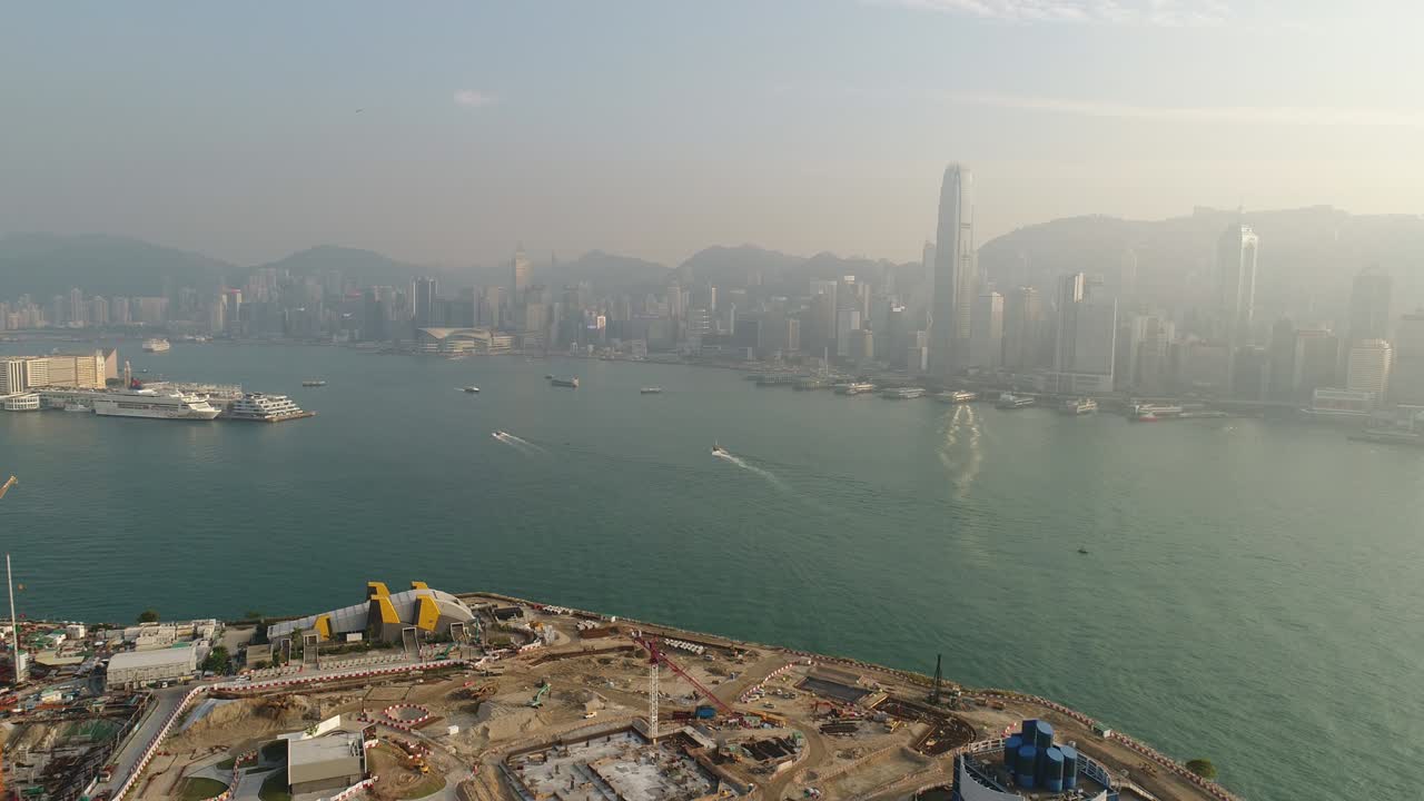 puesta de sol hong kong ciudad bahía de construcción famoso panorama aéreo 4k china