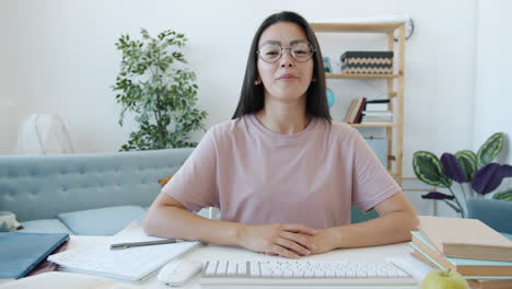 woman giving an online presentation/class