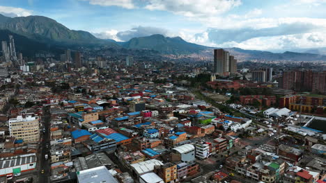 Aerial-view-over-the-cityscape-of-Bogota-city,-partly-sunny-day-in-Colombia