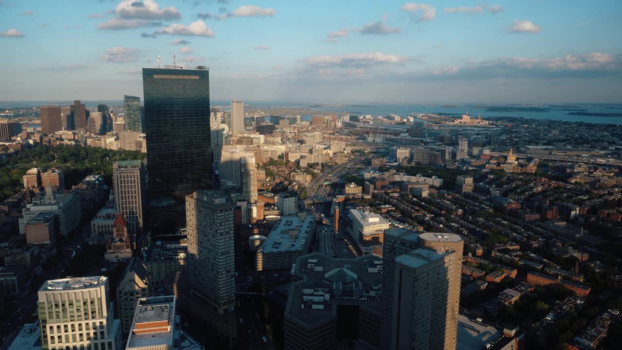 Aerial View of Boston City Skyline and Harbor at Sunset