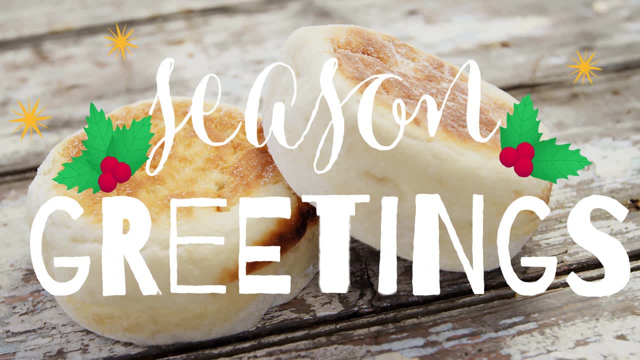 Toasted muffins on rustic table with holly leaves and season's greetings animation