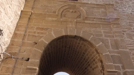 impressive artisan masonry on moroccan building, tilt down