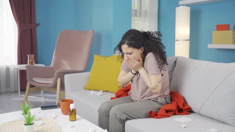 Young-woman-covering-mouth-and-nose-while-sneezing.