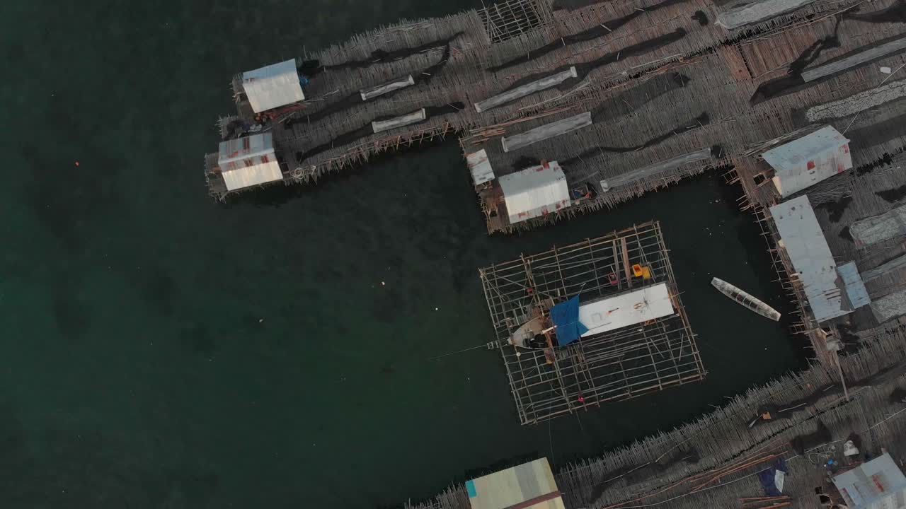 Aerial view of traditional fishing boat on water at sunset in Tanjung Binga Belitung Indonesia