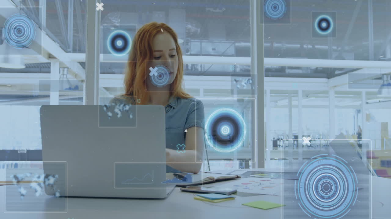 woman working on laptop in open office, interacting with floating graphs and data widgets for tech