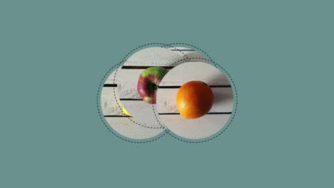 frutas en una mesa de madera blanca sobre el fondo de menta, vista de arriba