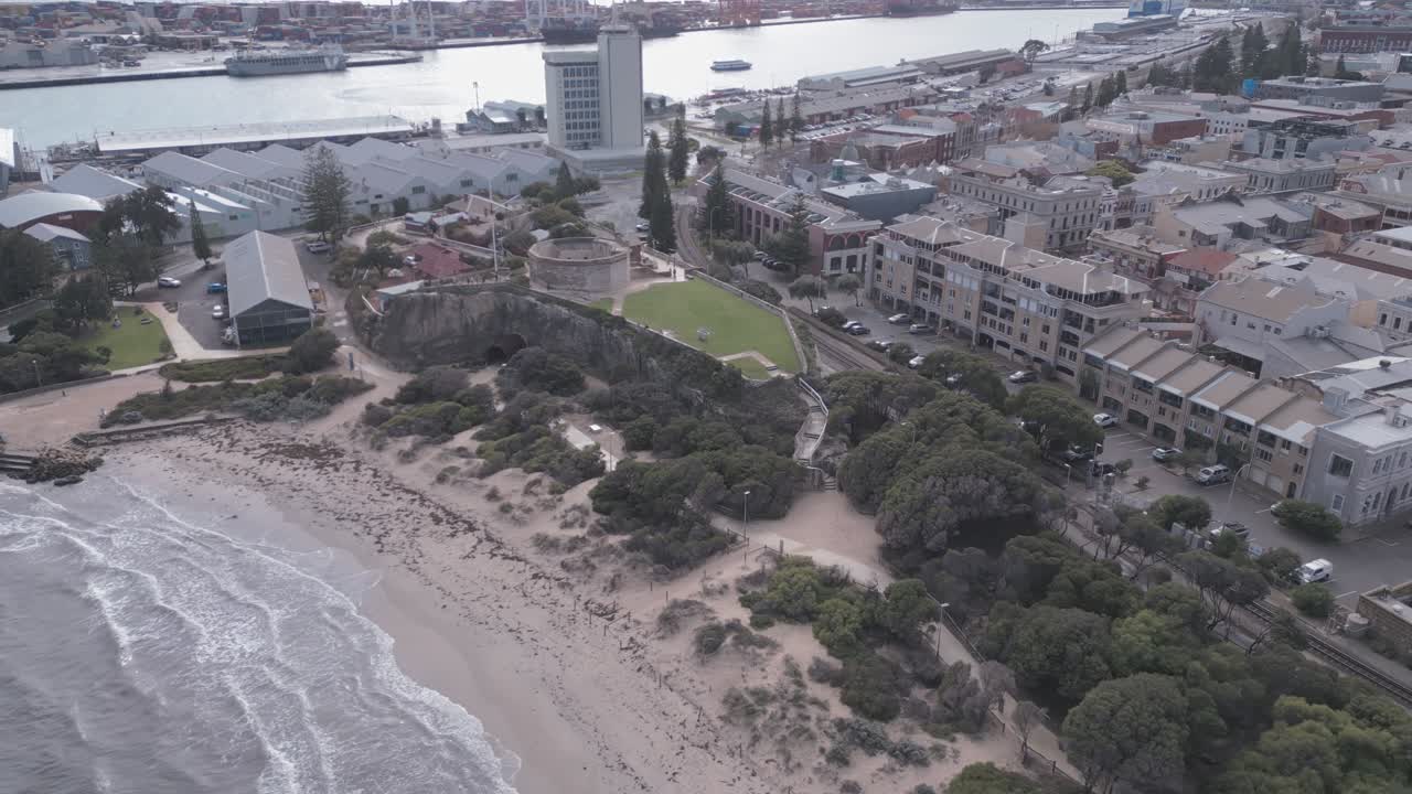 Cinematic aerial footage panning away from the Bathers Beach and The Round House in Fremantle, Perth, Western Australia