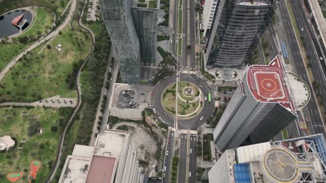 santa fe avenue surrounded by buildings, traffic flows in the afternoon in lomas de santa fe mexico city