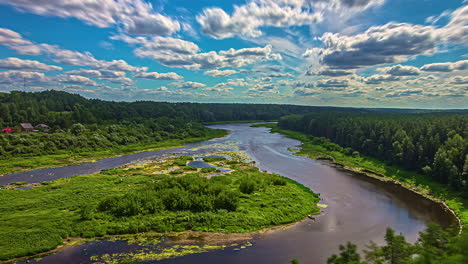 winding daugava river with island in woodland area, fusion time lapse on sunny day