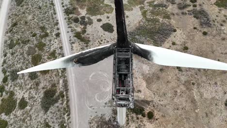 closeup view of a wind turbine destroyed by a fire