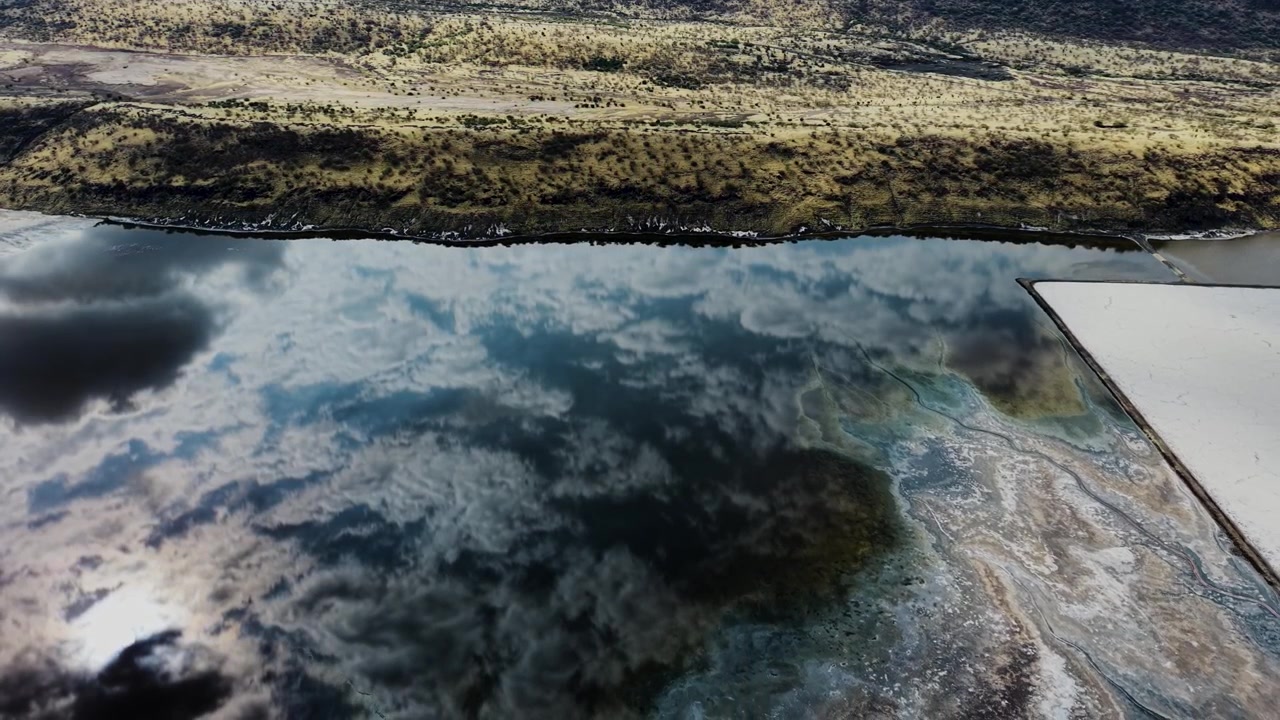 Lake Magadi kenya Sodaash Alkaline water salt lake Trona mineral deposits rift valley kenya . kenyan lake with Trona.