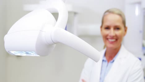 portrait of female dentist smiling