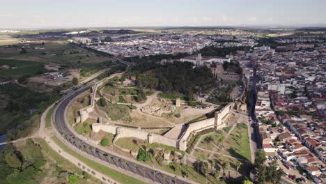 the alcazaba of badajoz view from above, ancient citadel orbiting shot