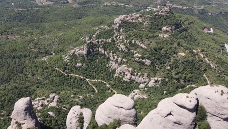 Aerial-views-of-Montserrat-peaks,-a-mountain-range-in-Catalonia