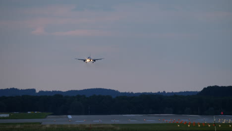 airplane landing at dusk