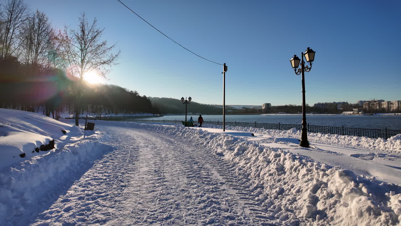 Valea Morilor lake and park covered in white snow in winter in Chisinau, Moldova