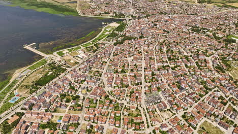 Beyşehir-Turkey-Aerial-v4-high-angle-birds-eye-view-drone-flyover-charming-lakeside-town-capturing-vastness-of-pristine-freshwater-lake-during-summer-season---Shot-with-Mavic-3-Cine---July-2022