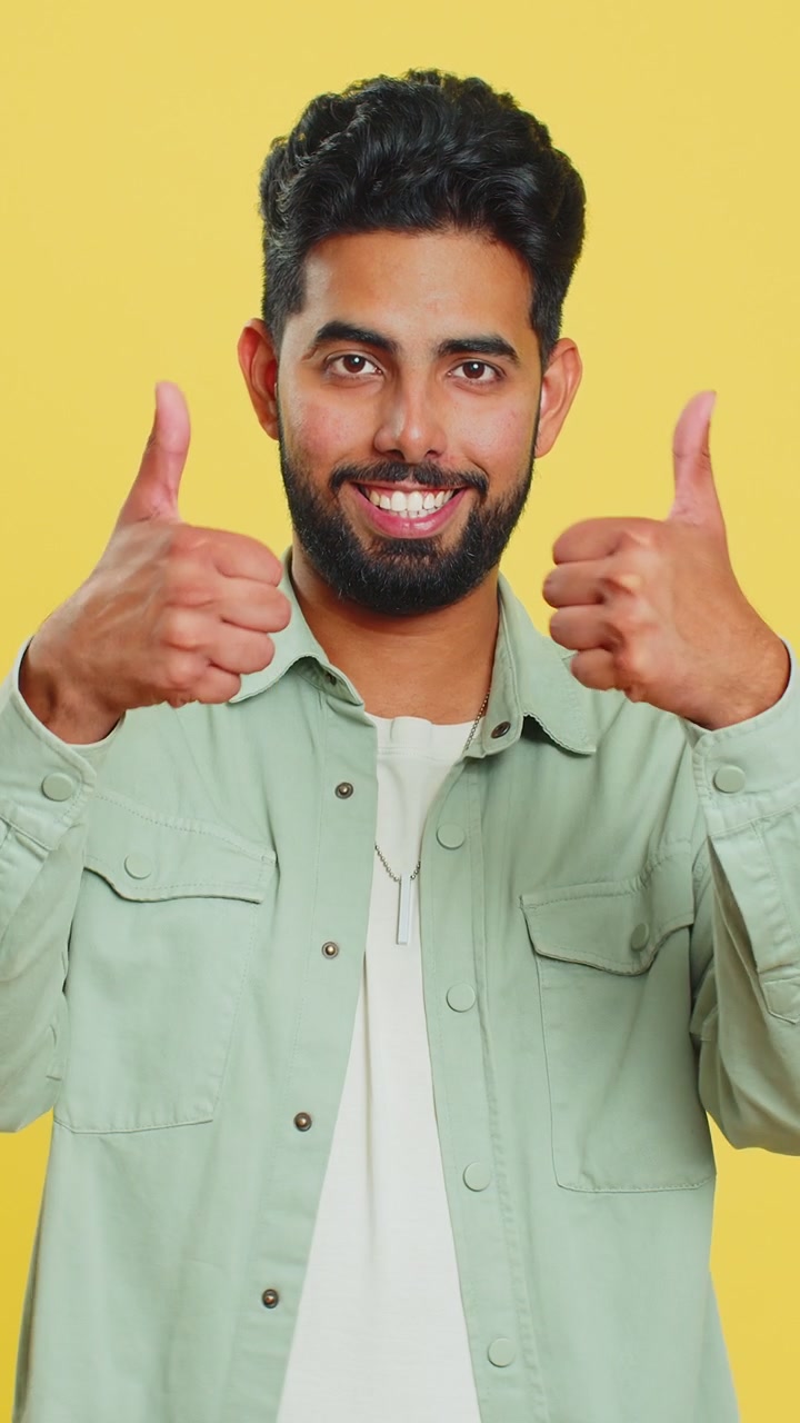 Indian man greatly approves your suggestion shaking head approval yes good idea feedback like