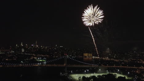 Aerial-footage-from-the-Astoria-Park-in-Queens,-NY-for-the-Firework-show-2017-that-happens-every-year-before-the-independence-day-of-USA-4th-of-July