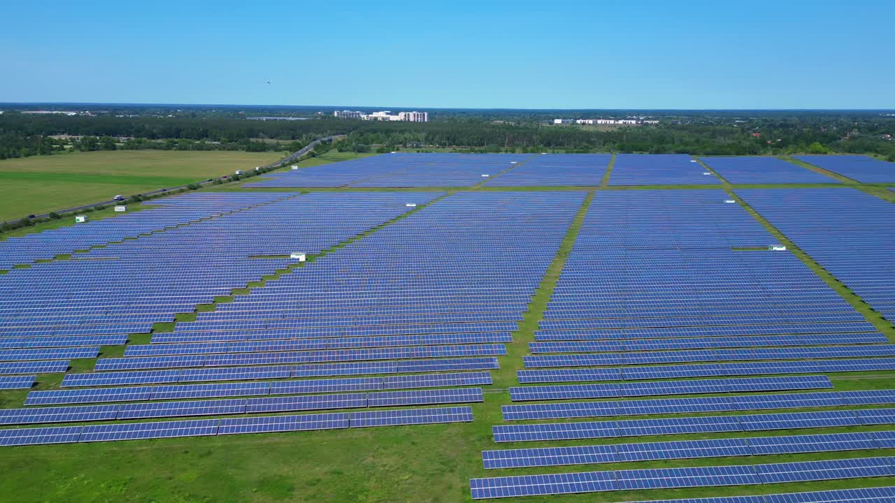 large solar farm in Germany, providing clean and sustainable energy. Magic aerial view flight drone shot footage from above