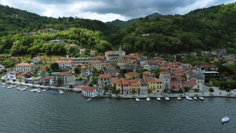 Ascending-aerial-of-picturesque-Italian-village-of-Pella-on-Lake-Orta,-Italy