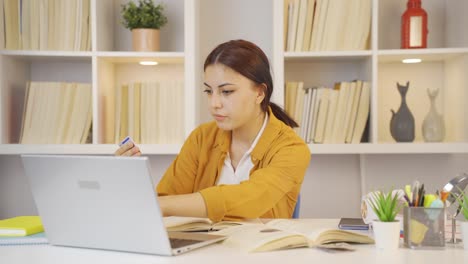 Female-student-doing-e-commerce-shopping.