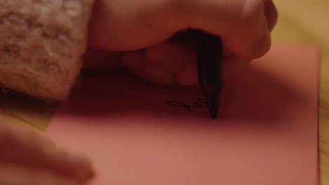 child writing a letter