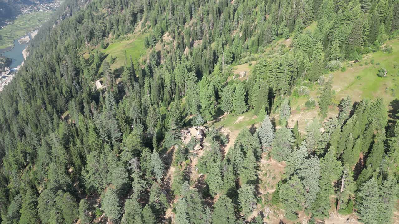 Afghanistan Hindu Kush Drone Aerial view, sunny mountain valley village vast mountains and forests in Nangahar Nuristan