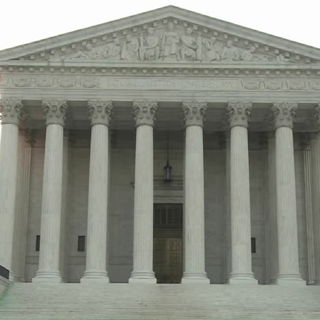 a zoom into the supreme court building at washington dc>