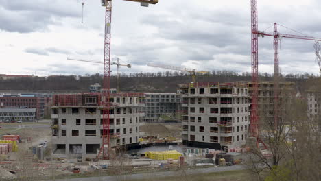 Building-of-new-offices-in-Prague,-construction-site-with-tower-cranes