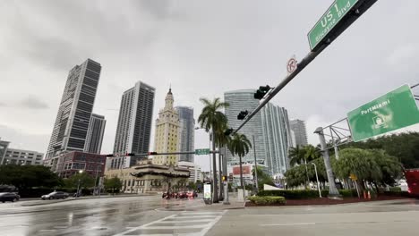 miami bayfront park downtown with port miami sign, rainy overcast midday static establishing