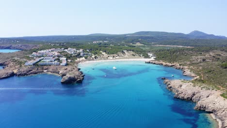 luxury accomodation in menorca spain with boats anchored close to shore