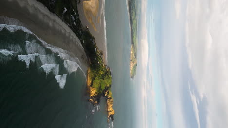 Vertical-Stunning-landscape-of-Huriawa-Historic-Site-during-golden-hour