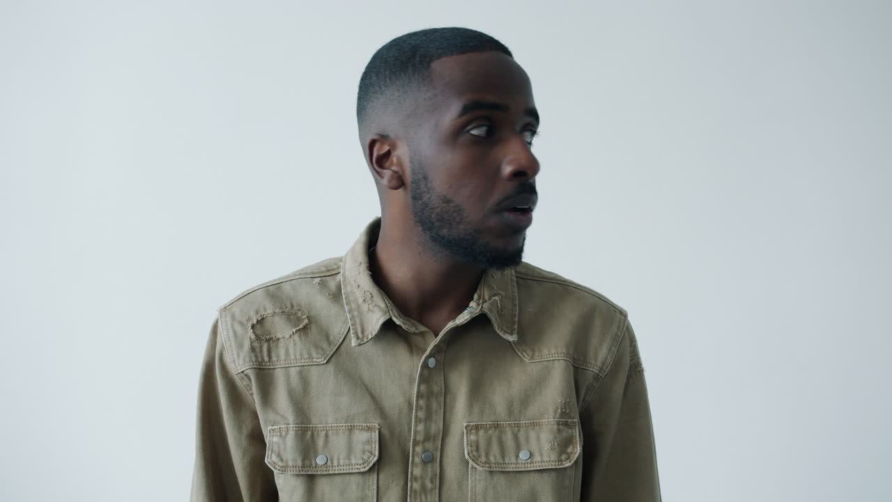 Man in Khaki Shirt Profile View