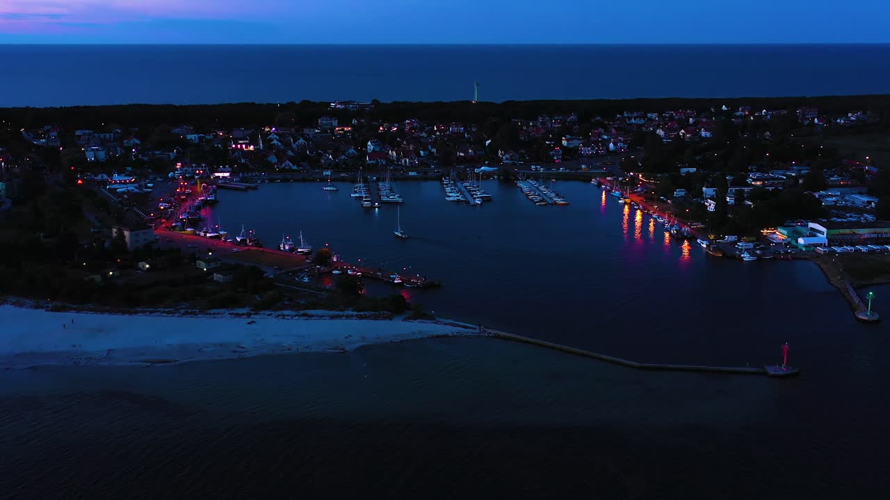 Beautiful Night color sky, sunset by the Baltic Sea, Jastarnia, Poland. Harbor. Aerial View