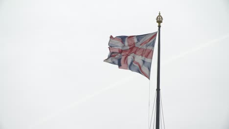 uk flag flying on westminster