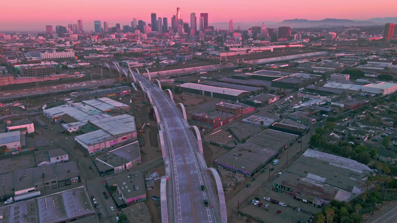 Sixth Street Viaduct Bridge drone tilt up revealing DTLA Skyline - Artist District (Los Angeles, California)
