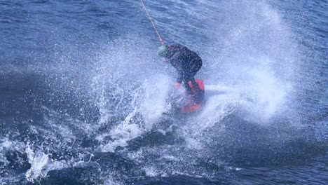 extreme man studying riding wakeboarding stunt on water. extreme water sports