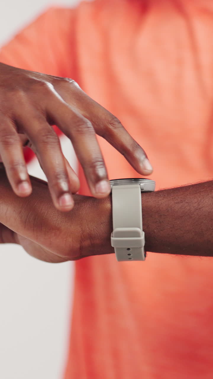 Person Tapping and Swiping on a Smartwatch Screen