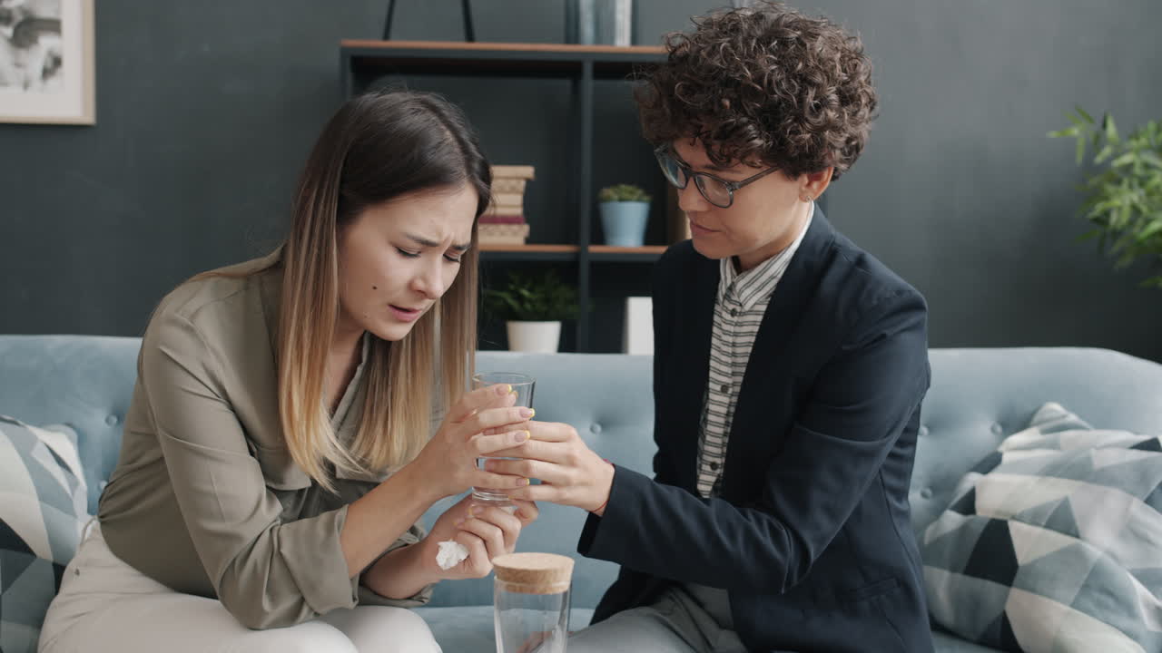 Therapist comforting a patient