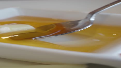 butter and honey in a dish