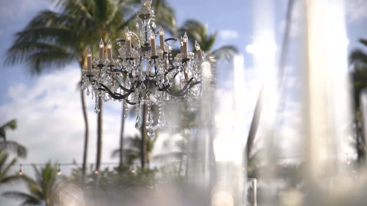 Beautiful Wedding Venue Reception Decoration Slider to Chandelier Rack Focus