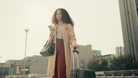 woman, phone and luggage with waiting in city