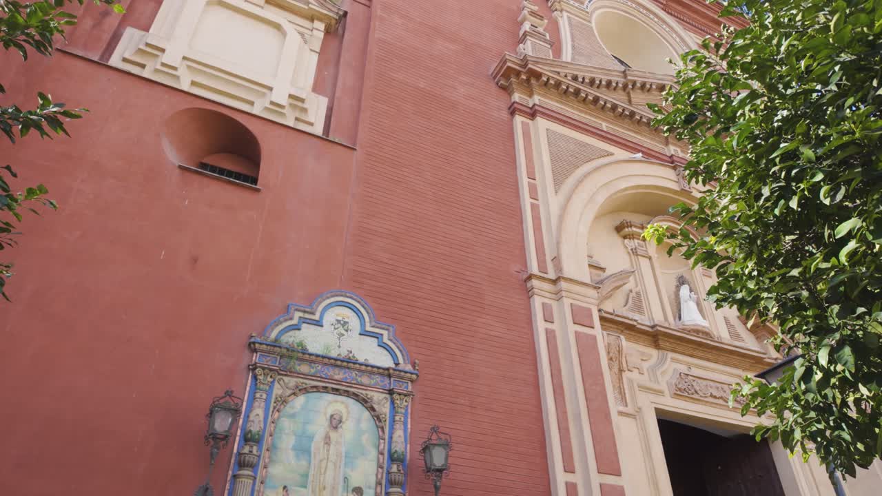 Low angle view of the Parish Church of San Jacinto, a baroque style building located in the Triana district of Seville, Spain