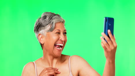 selfie, green screen and senior woman with funny