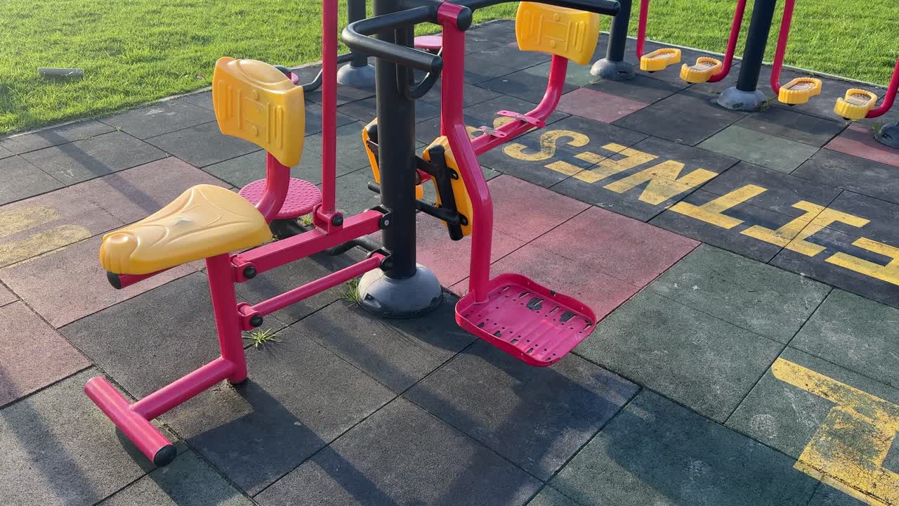 Outdoor gym equipment still moving after a person used it. Cape Town, South Africa