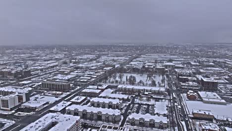 snow-covered winter cityscape aerial view of downtown salt lake city, utah